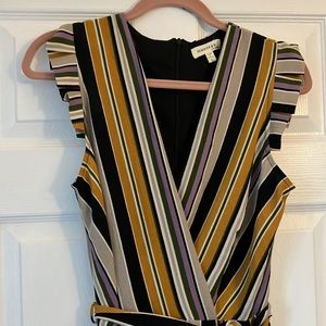 Belted jumpsuit/romper. New without tags. Size L fits like a M.